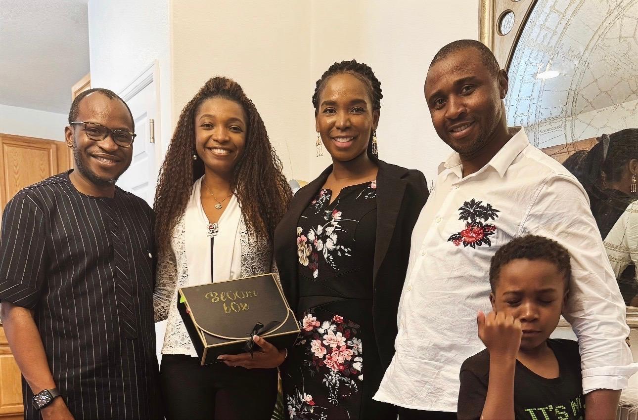 Bloom Box presentation ceremony with community members celebrating together